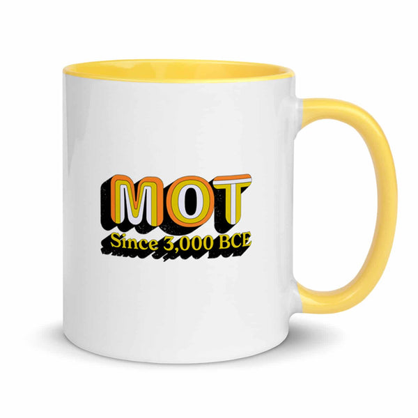 white and yellow ceramic mug with a grungy design that reads "MOT since 3,000 BCE". MOT referring to Member of the (Jewish) Tribe