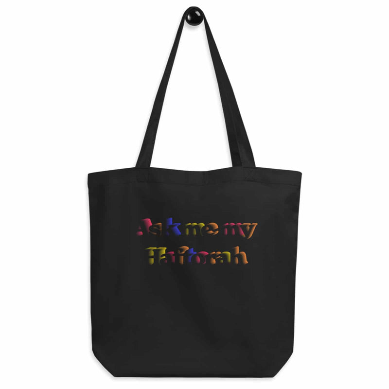 black colored tote bag with design that reads "ask me my haftorah"