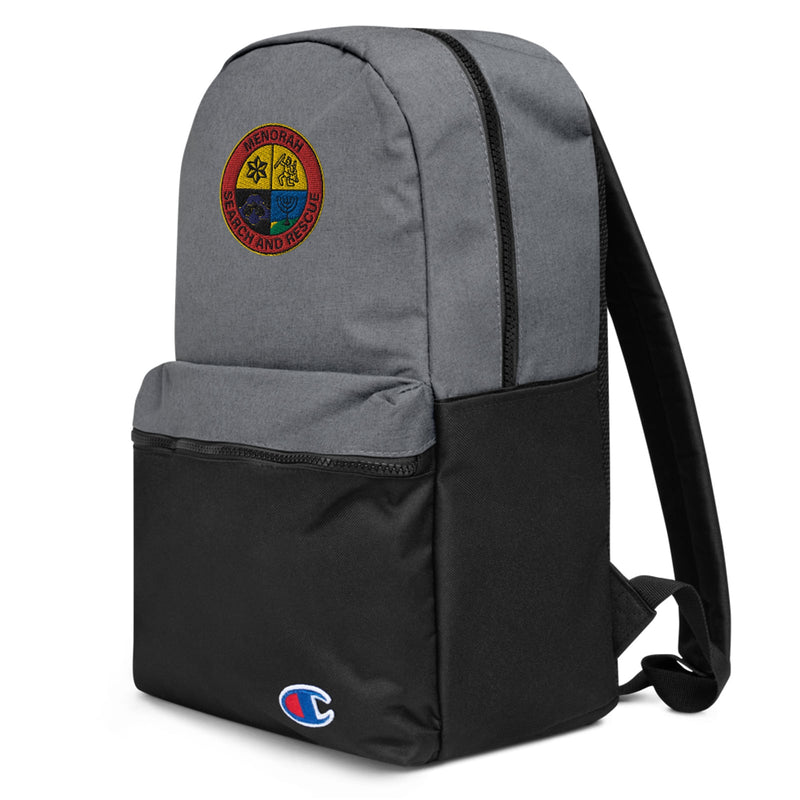 gray and black Champion-brand backpack, with a patch on the front that reads "Menorah search and rescue"